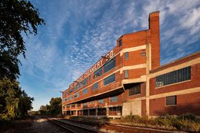Cleveland apartment for rent - A red brick building with the words "BREAKFAST GREENE" on the side.