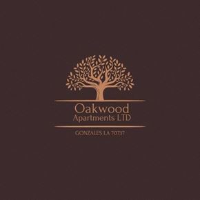 Gonzales apartment for rent - a logo for an apartment building with a tree