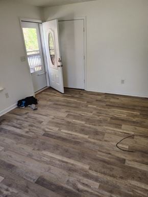 Grayson house for rent - the living room is ready to be remodeled with wood flooring