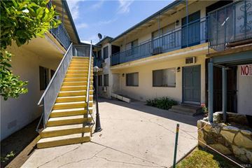 Winnetka apartment for rent - A building with a yellow staircase in front of it.