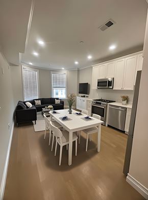 Brighton apartment for rent - A modern kitchen with a dining table and chairs.
