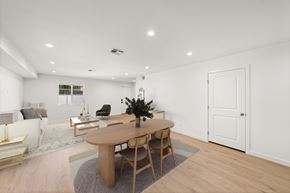 North Hollywood apartment for rent - A dining room with a wooden table and chairs.