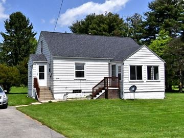 Brookfield house for rent - a white house with a porch and a yard