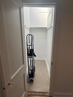 Washington apartment for rent - a walk in closet in a home with a wheelchair in it