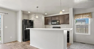 Meridian apartment for rent - a kitchen with a counter top and a refrigerator