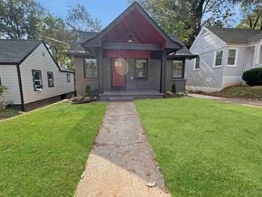 Atlanta apartment for rent - the front of a house with a walkway and lawn