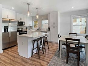 Atlanta apartment for rent - a kitchen with an island and a table with chairs