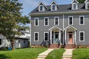 Richmond house for rent - a gray house with a green door and a lawn