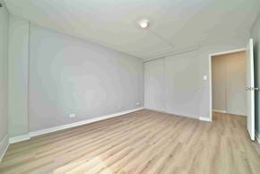 Winnipeg apartment for rent - A room with wooden flooring and white walls.