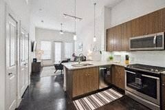 Richardson house for rent - a large kitchen with a stove and a sink