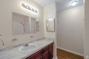 Russellville apartment for rent - A bathroom with a sink and mirror.