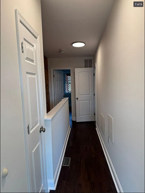 Baltimore house for rent - a hallway with white walls and a white door