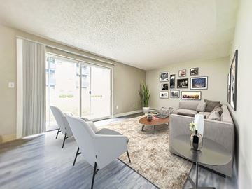 Spokane apartment for rent - a living room with a couch and a table