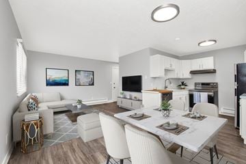 Roy apartment for rent - a living room and dining room with a table and chairs