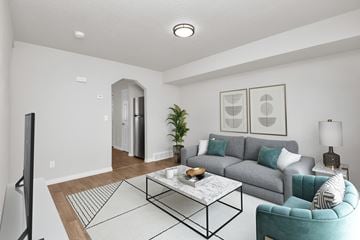 Ogden apartment for rent - a living room with a couch and a coffee table