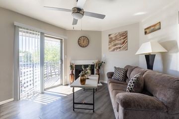 Prescott apartment for rent - a living room with a couch and a ceiling fan