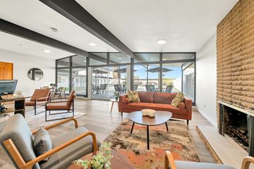 Tacoma apartment for rent - a living room with couches and chairs and a fireplace