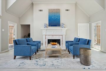 Dallas apartment for rent - a vase of flowers on a table in a living room