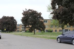 Brantford apartment for rent - A car is parked on the side of a street.