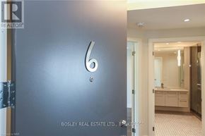 Fort Erie (Crystal Beach) condo for rent - a door with the number 6 on it in a bathroom