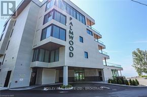 Fort Erie (Crystal Beach) condo for rent - a large building with a glass roof in a parking lot