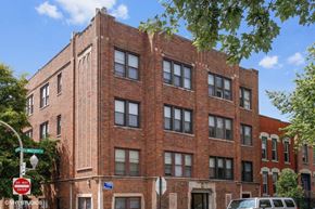 Chicago apartment for rent - a red brick building on a city street