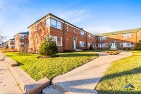 Chicago apartment for rent - a brick building with a sidewalk in front of it