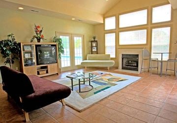 Farmville apartment for rent - a living room with a couch and a television