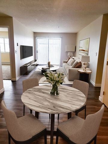 Grand Forks apartment for rent - a living room and dining room with a table and chairs