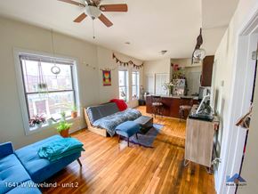 Chicago apartment for rent - a view of the living room and kitchen from the dining room