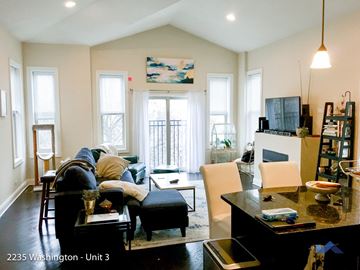 Chicago apartment for rent - a living room with a couch and a table