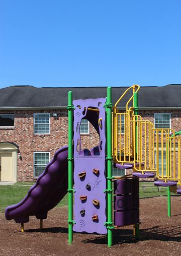 New Orleans apartment for rent - a playground with a purple slide and