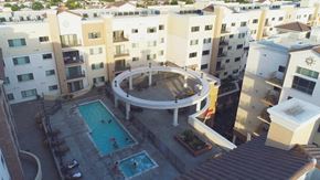Monterey Park apartment for rent - A round patio with a pool in the middle of apartment buildings.