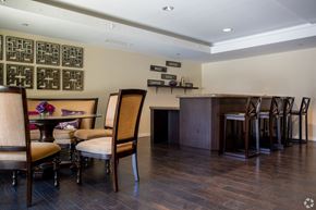 Monterey Park apartment for rent - A dining room with a table set for four.