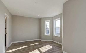Washington house for rent - A room with a window and a door.