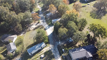 Phenix City apartment for rent - A residential area with houses and trees.