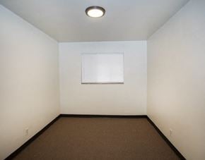 North Versailles apartment for rent - an empty room with a white wall and a window