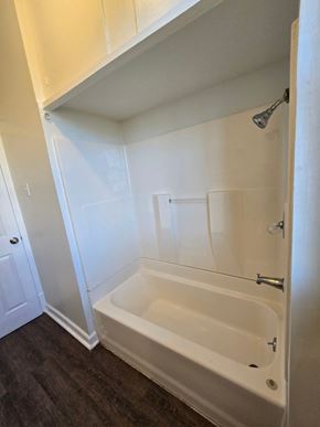 Saint Louis house for rent - a small bathroom with a shower and a bath tub