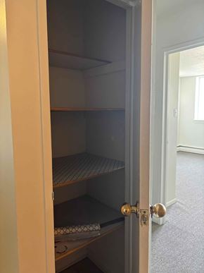 Halifax apartment for rent - A pantry with a closed door and an open door.