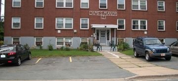 Halifax apartment for rent - A brick building with the name James Manor on it.