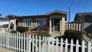 Ventura apartment for rent - a small house with a white fence in front of it