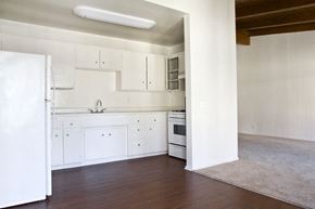Los Angeles apartment for rent - A kitchen with white appliances and cabinets.
