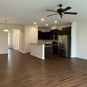 Indian Land house for rent - A kitchen with a refrigerator, microwave, and oven.