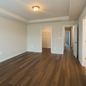 Indian Land house for rent - A room with wooden floors and white walls.