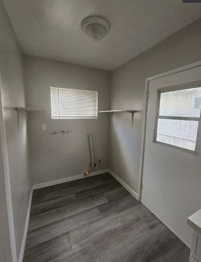 Ontario apartment for rent - A room with a window and a door is shown.