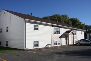 Berwick apartment for rent - A white building with a car parked in front.
