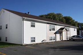 Berwick apartment for rent - A white building with a car parked in front.