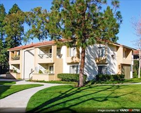 Laguna Niguel apartment for rent - A building with a red tile roof and a balcony.