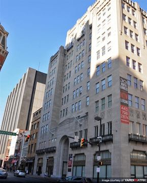 Baltimore apartment for rent - a large building on the corner of a city street