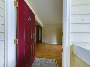 Mountlake Terrace apartment for rent - A red door with the number 25 on it.